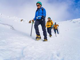 Hikers exploring volcanic landscapes